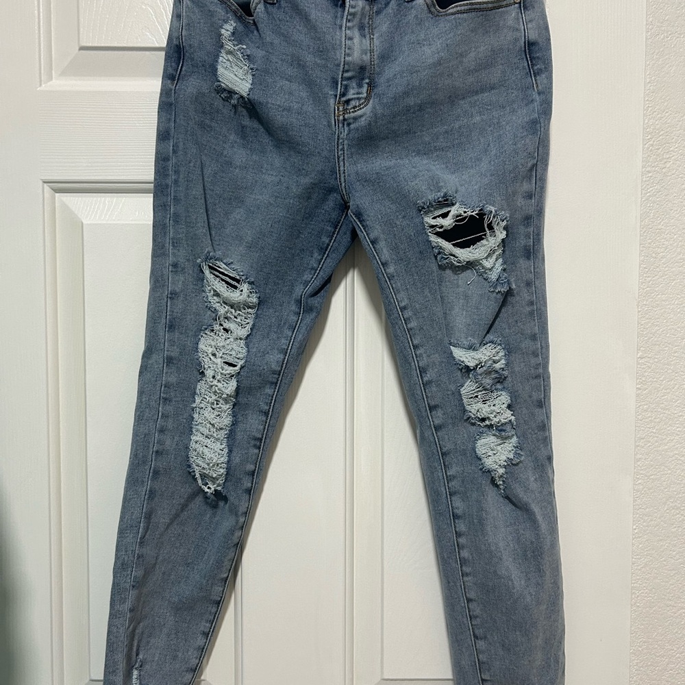 Women's Distressed Blue Jeans
